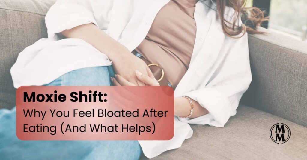 woman holding stomach feeling bloated after eating with natural digestion support concept